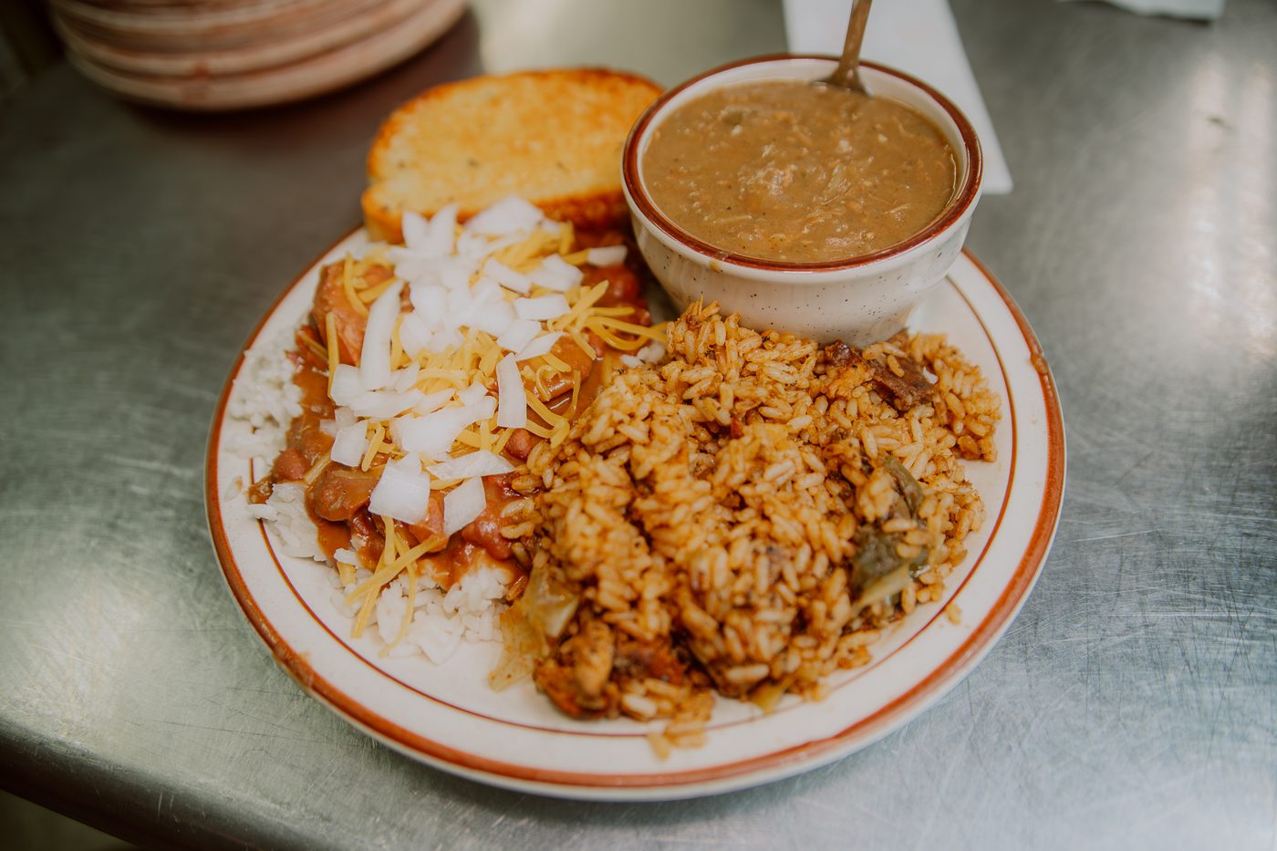 Cajun plate with rice, gravy, and garlic bread