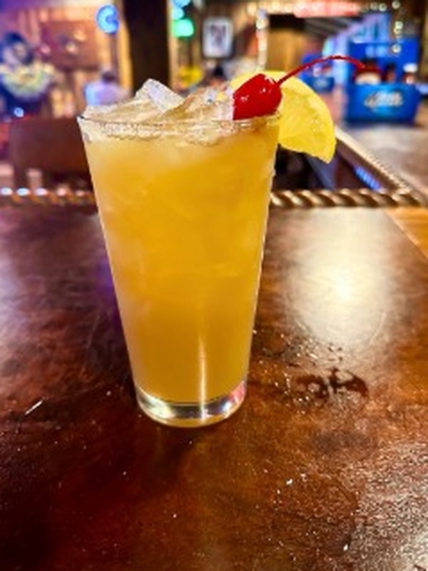Long Island Tea with lemon and cherry
