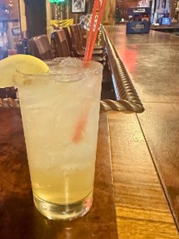 Porch Swing Punch with lemon wedge