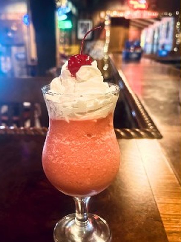 Frozen strawberry daiquiri with whipped cream