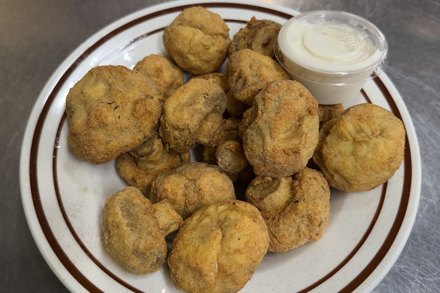 Hand-breaded fried mushrooms with ranch